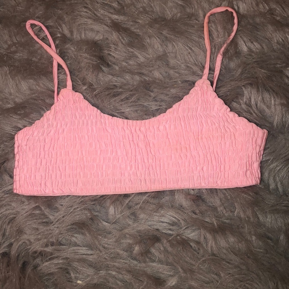 Pink swim top.